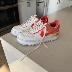 Nike Air Force 1 Low in White, Red, and Green